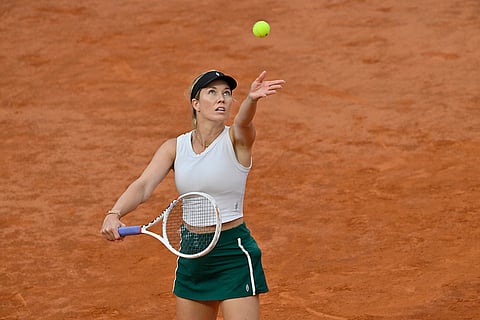 Danielle Collins serves to Victoria Azarenka